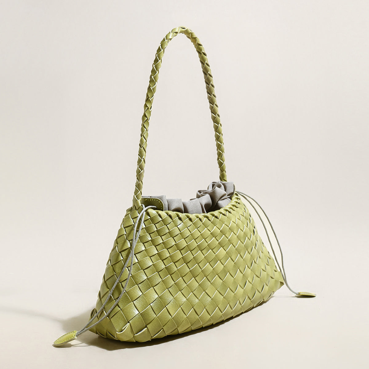 Mini Woven Trapezoid Drawstring Shoulder Bag-1