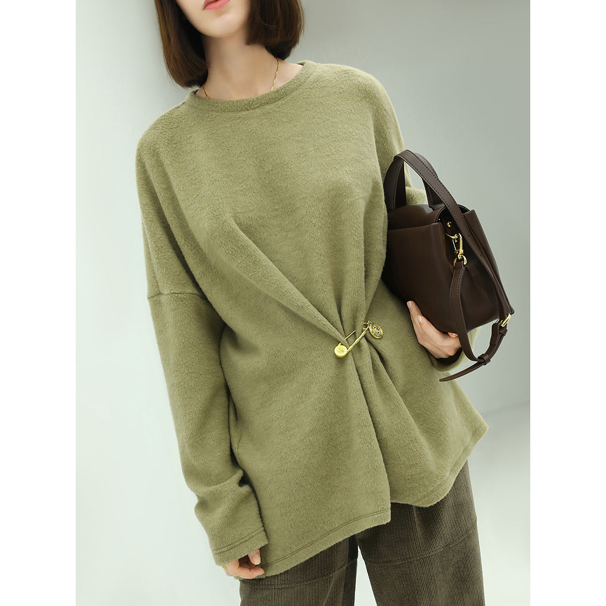 Oversized Green Fleece Knit with a Stylish Cinched Brooch Pin-1